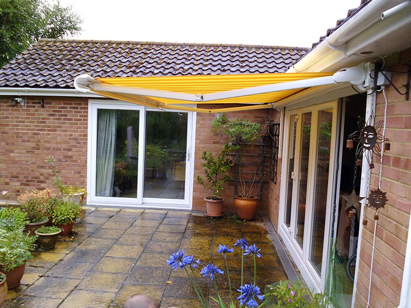 yellow awning with white cassette